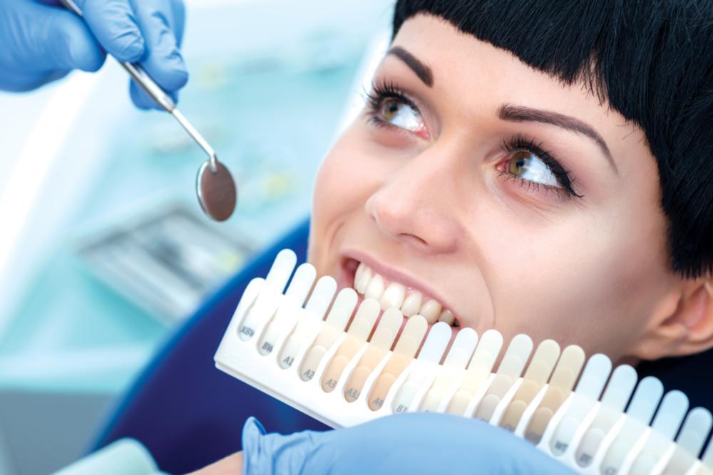 A woman gets her teeth whitened | Teeth Whitening Evansville IN
