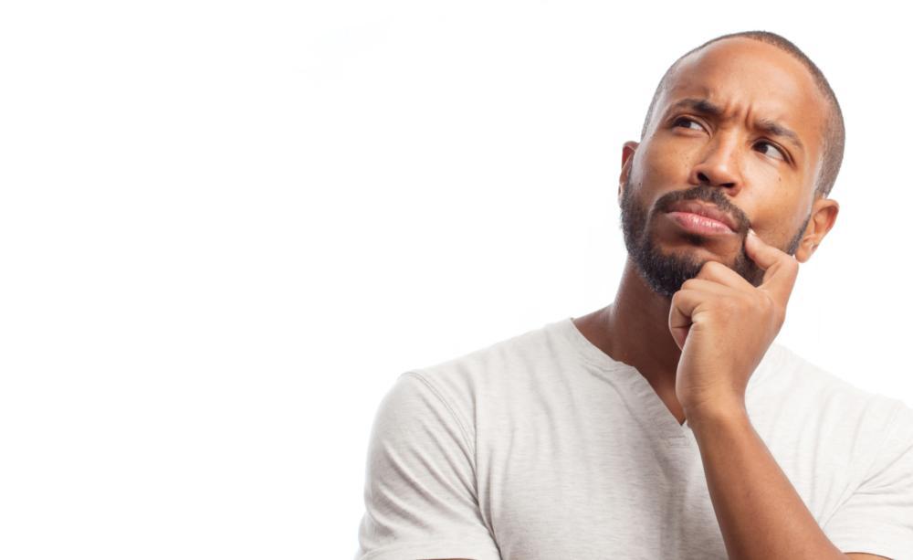 A man looks up questioningly | preventive dentist evansville